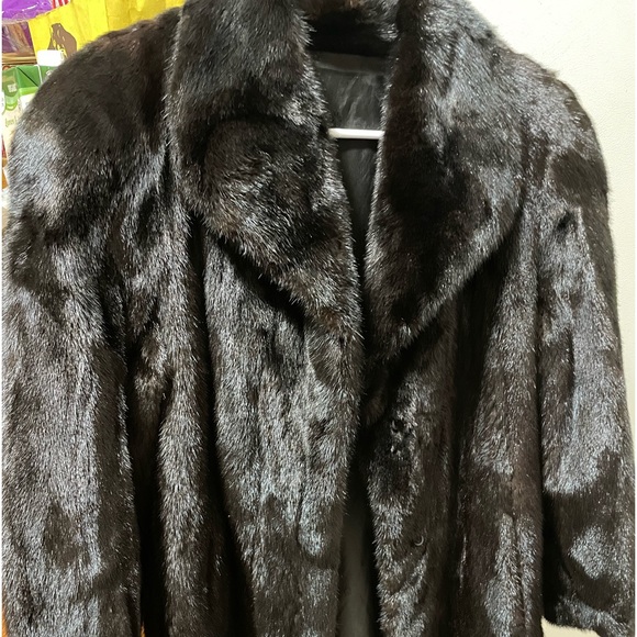 Mink coat size 8 very cozy in superb cond 3/4 long inside and outside pockets